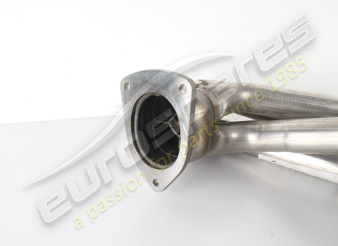 NEW MASERATI COMPLETE RH EXHAUST MANIFOLD. PART NUMBER 195117 (3) new maserati complete rh exhaust manifold. part number 195117 (3)