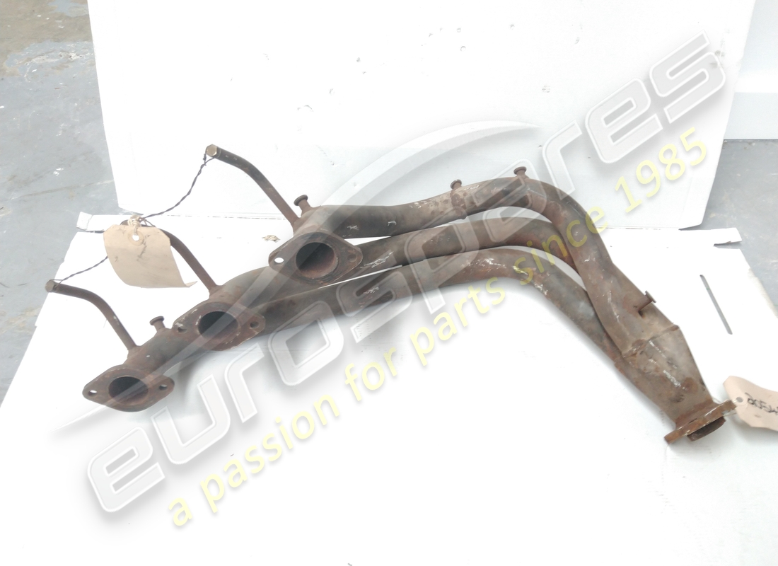 USED FERRARI FRONT MANIFOLD ORIGINAL ANSA USA VERSION. PART NUMBER 20545 (2) used ferrari front manifold original ansa usa version. part number 20545 (2)