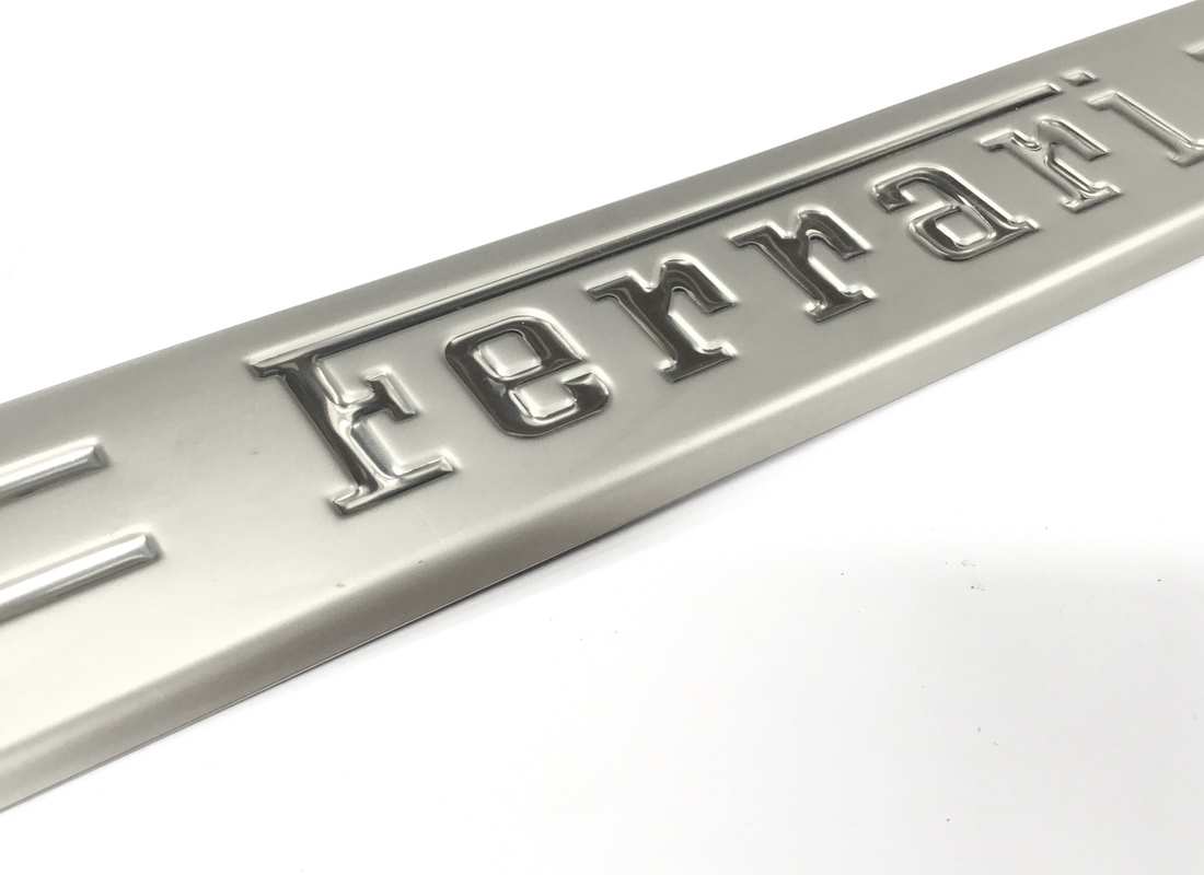 USED FERRARI RH KICKPLATE. PART NUMBER 86786100 (3) used ferrari rh kickplate. part number 86786100 (3)