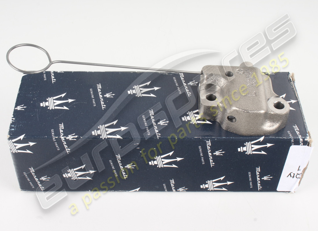 NEW MASERATI LH HYDRAULIC CHAIN TENSIONER. PART NUMBER 339038 (1) new maserati lh hydraulic chain tensioner. part number 339038 (1)