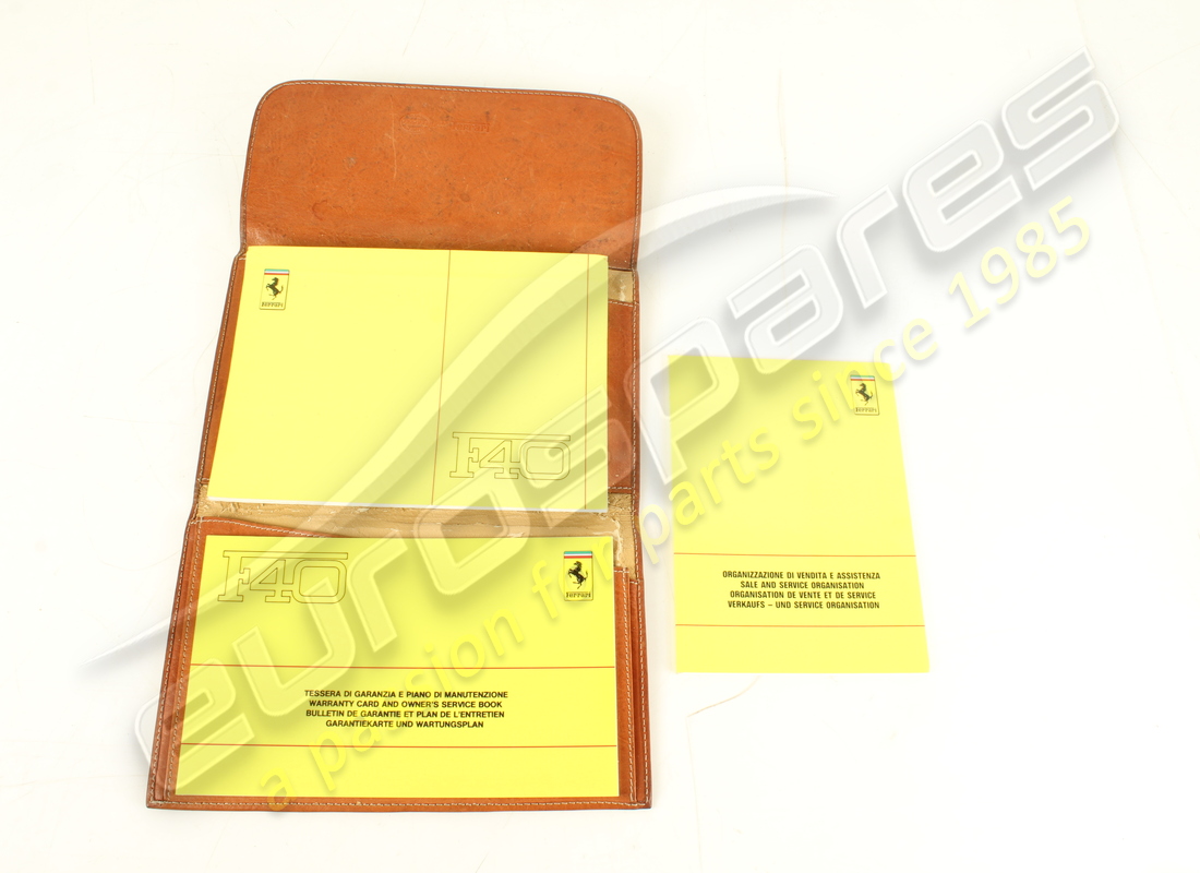 USED FERRARI F40 POUCH & BOOK PACK. PART NUMBER 959908800 (7) used ferrari f40 pouch & book pack. part number 959908800 (7)