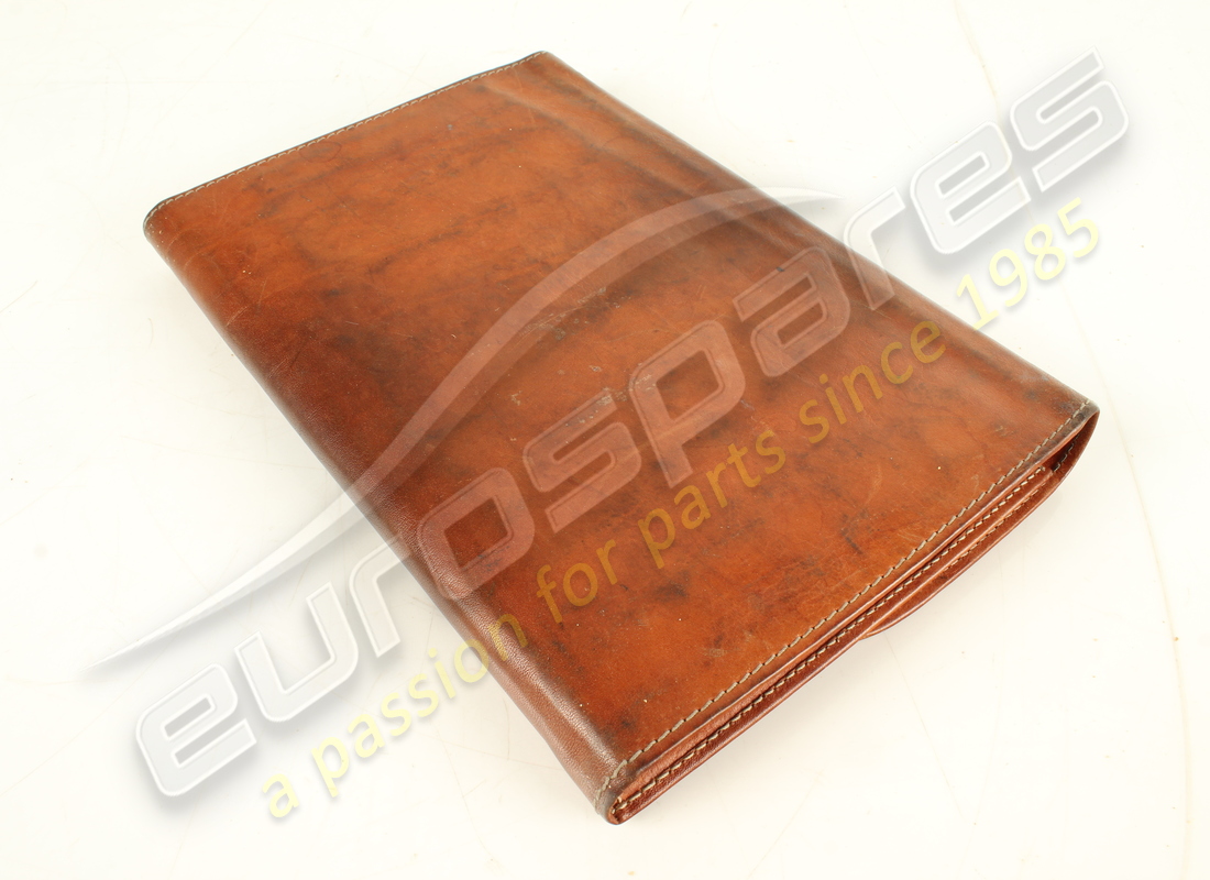 USED FERRARI F40 POUCH & BOOK PACK. PART NUMBER 959908800 (5) used ferrari f40 pouch & book pack. part number 959908800 (5)