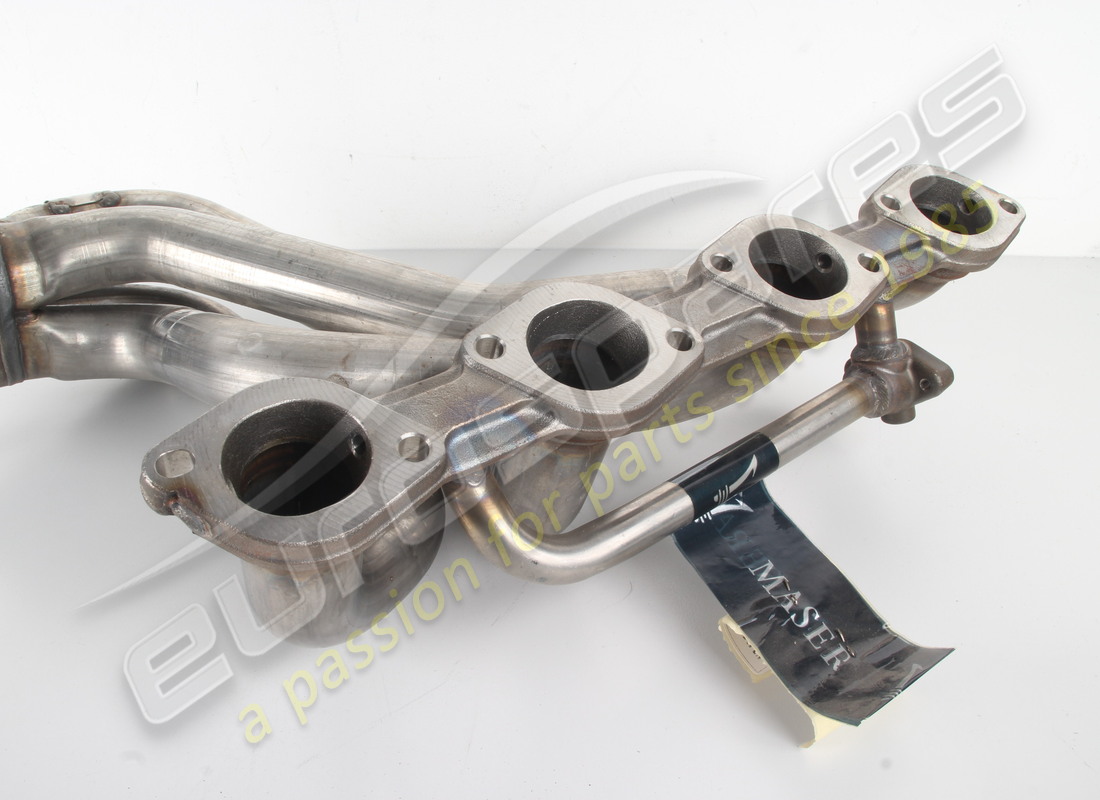 NEW MASERATI COMPLETE RH EXHAUST MANIFOLD. PART NUMBER 195117 (2) new maserati complete rh exhaust manifold. part number 195117 (2)