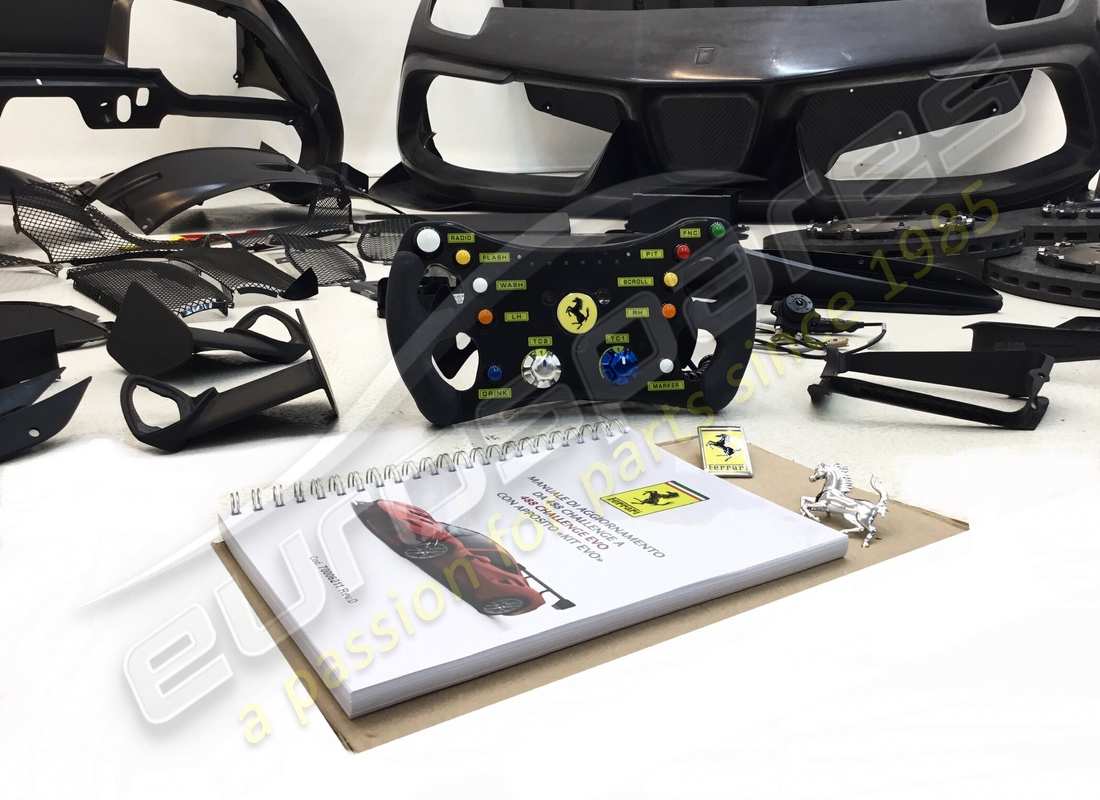 NEW FERRARI CHALLENGE EVO KIT. PART NUMBER 967812 (4) new ferrari challenge evo kit. part number 967812 (4)