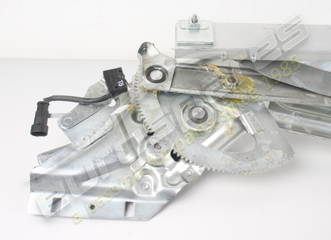 NEW FERRARI COMPLETE LH DEVICE FOR GLASS LIFT. PART NUMBER 69919900 (2) new ferrari complete lh device for glass lift. part number 69919900 (2)