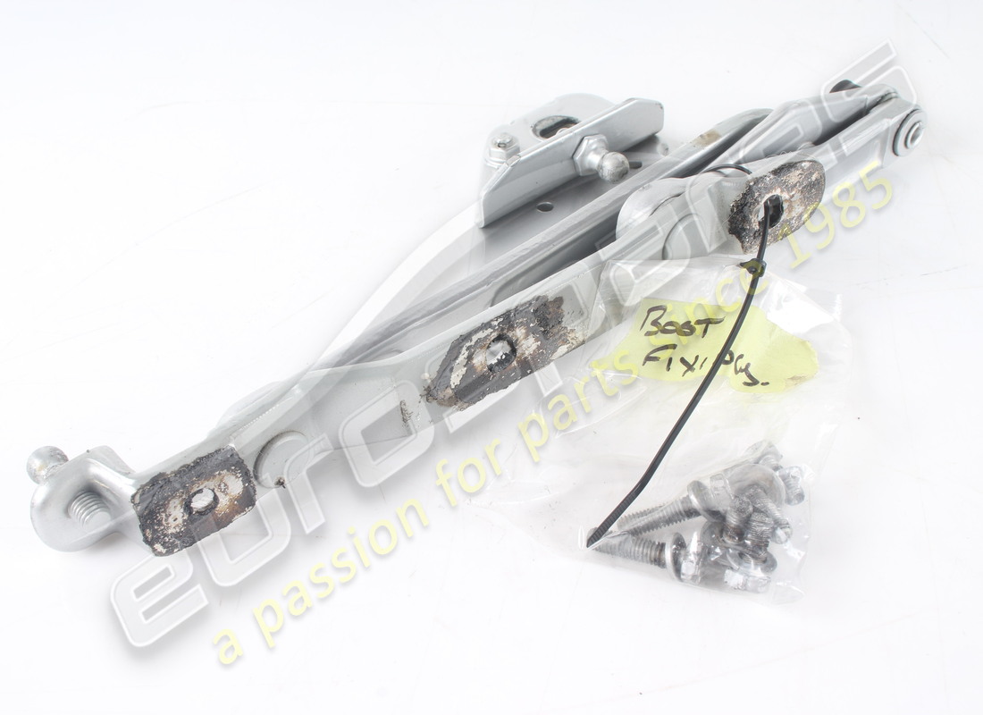 USED FERRARI LH LID HINGE. PART NUMBER 63143100 (1) used ferrari lh lid hinge. part number 63143100 (1)