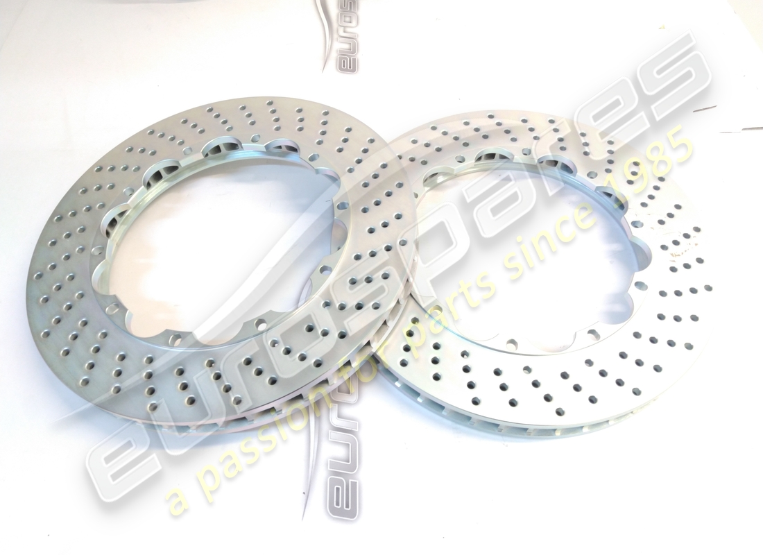 NEW FERRARI FRONT AND REAR BRAKE DISC (PAIR). PART NUMBER 70000602A (2) new ferrari front and rear brake disc (pair). part number 70000602a (2)