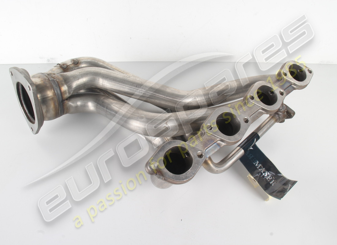 NEW MASERATI COMPLETE RH EXHAUST MANIFOLD. PART NUMBER 195117 (1) new maserati complete rh exhaust manifold. part number 195117 (1)