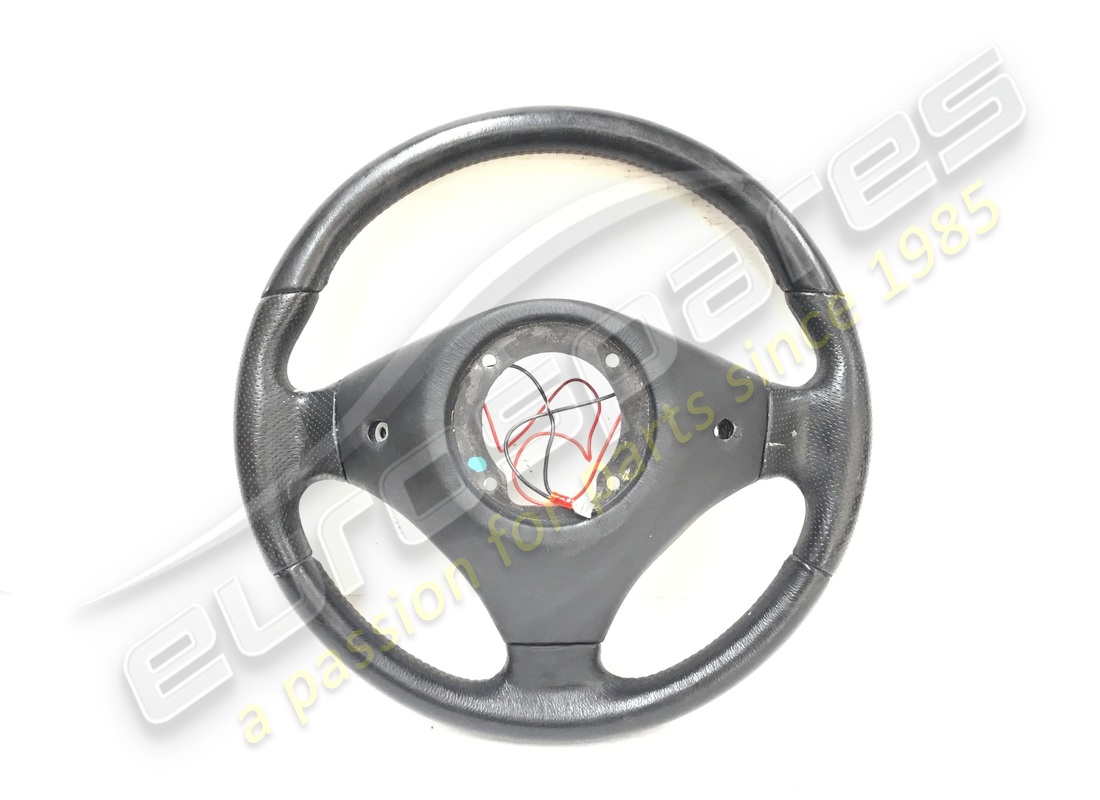USED FERRARI STEERING WHEEL COMPLETE. PART NUMBER 165021 (2) used ferrari steering wheel complete. part number 165021 (2)