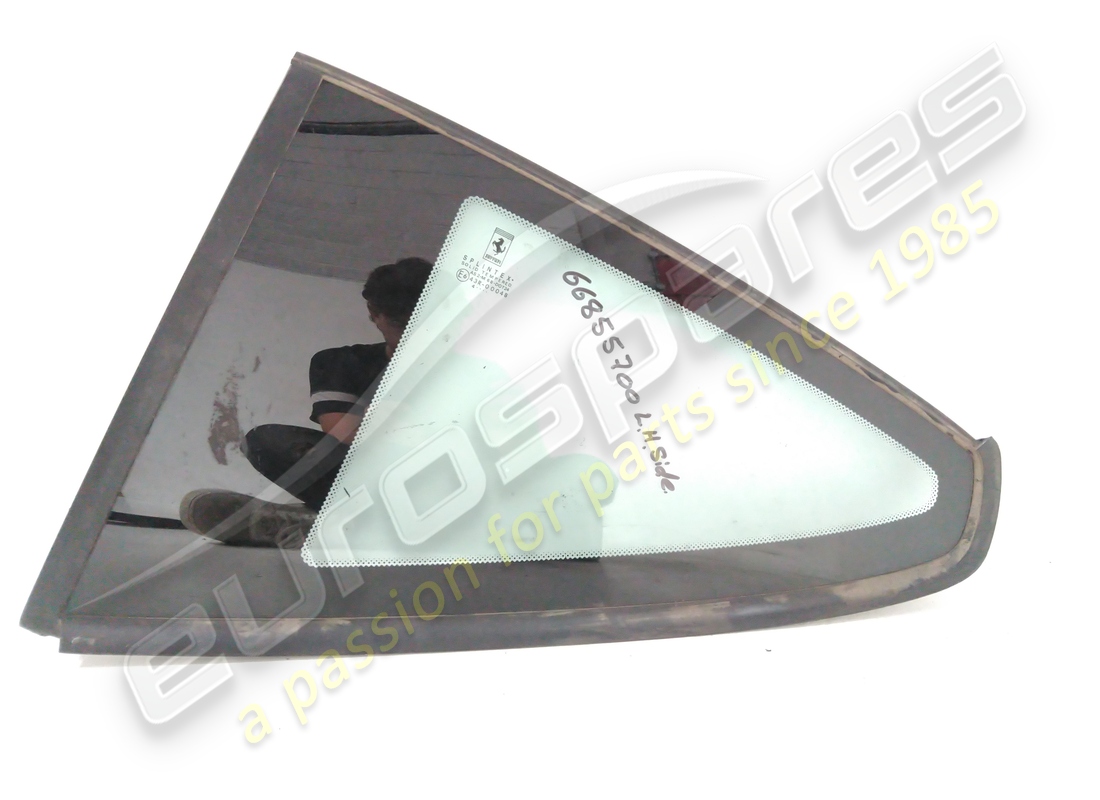 USED FERRARI LH REAR SIDE GLASS. PART NUMBER 66855700 (1) used ferrari lh rear side glass. part number 66855700 (1)