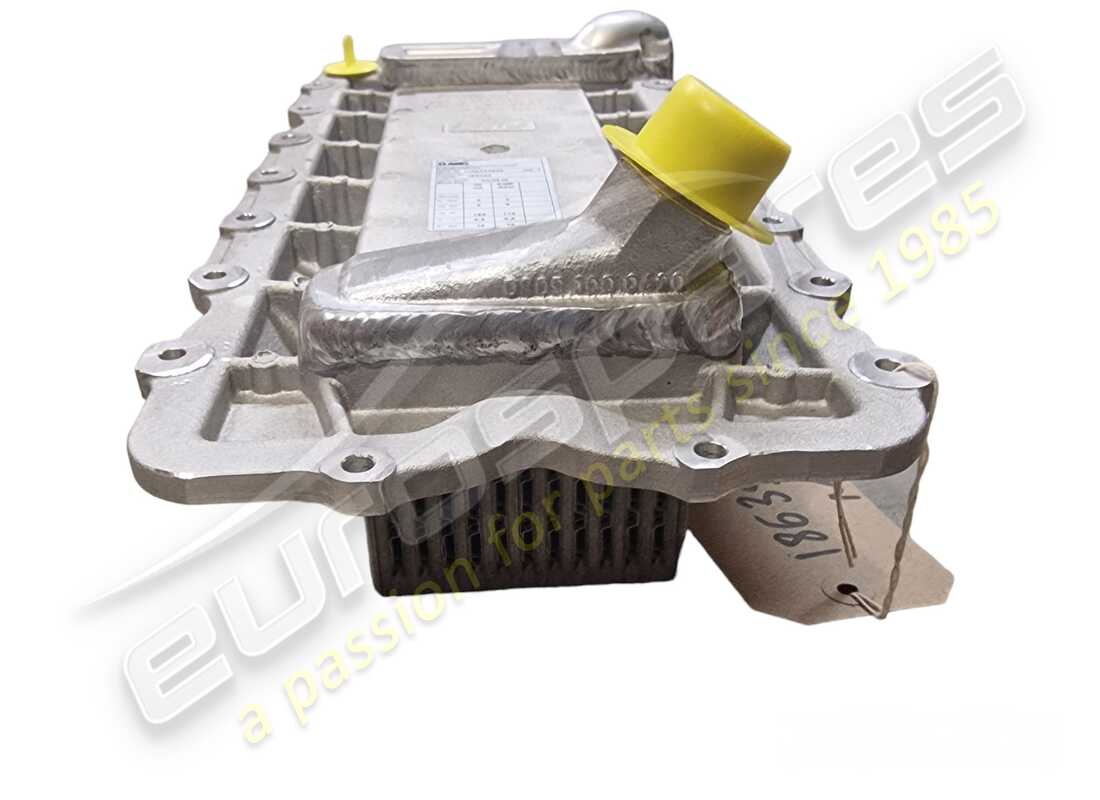 NEW MASERATI WATER/OIL EXCHANGER. PART NUMBER 186356 (4) new maserati water/oil exchanger. part number 186356 (4)