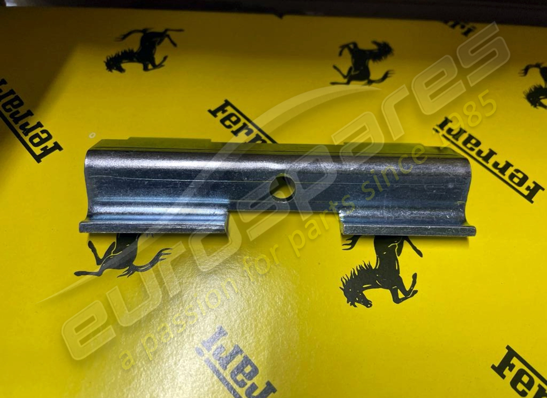 NEW FERRARI BRACKET. PART NUMBER 62573400 (1) new ferrari bracket. part number 62573400 (1)