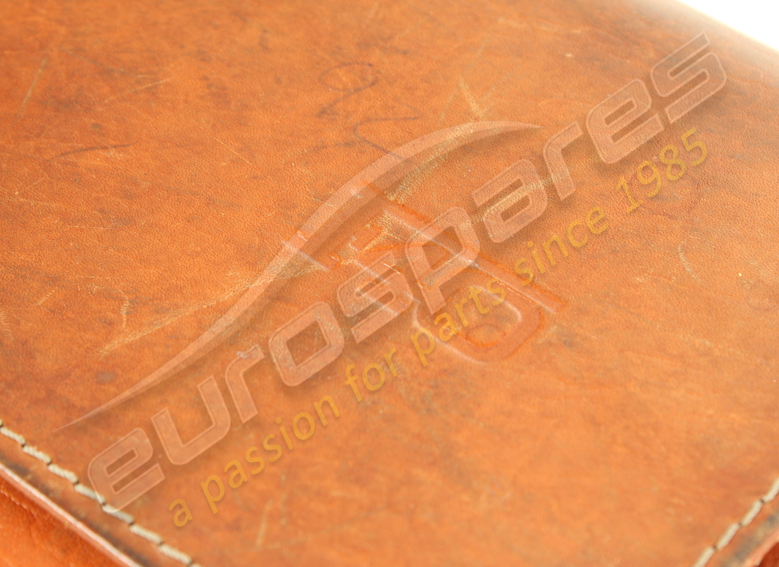 USED FERRARI F40 POUCH & BOOK PACK. PART NUMBER 959908800 (3) used ferrari f40 pouch & book pack. part number 959908800 (3)