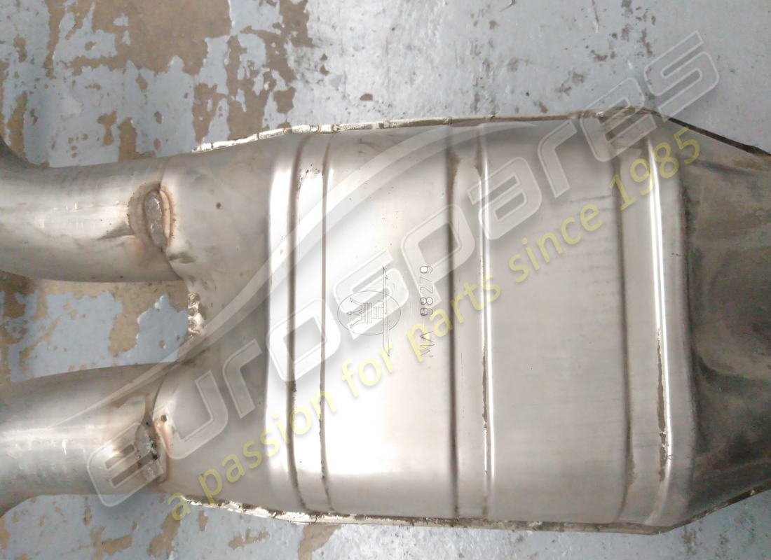 NEW MASERATI MANIFOLD WITH CATALYTIC CONVERTER. PART NUMBER 389005104 (4) new maserati manifold with catalytic converter. part number 389005104 (4)