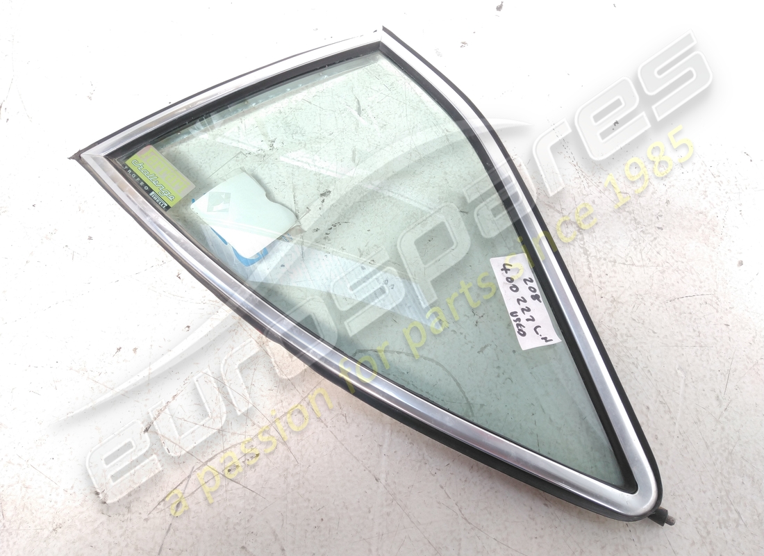 NEW FERRARI LH REAR QUARTER LIGHT GLASS CLEAR. PART NUMBER 400227 (1) new ferrari lh rear quarter light glass clear. part number 400227 (1)