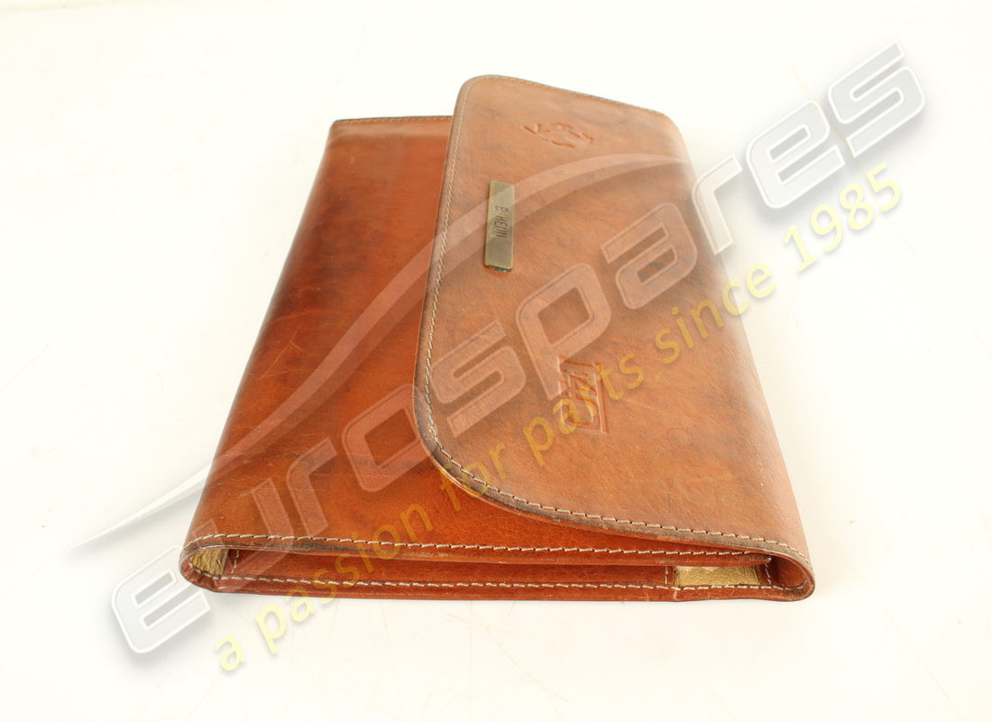 USED FERRARI F40 POUCH & BOOK PACK. PART NUMBER 959908800 (4) used ferrari f40 pouch & book pack. part number 959908800 (4)