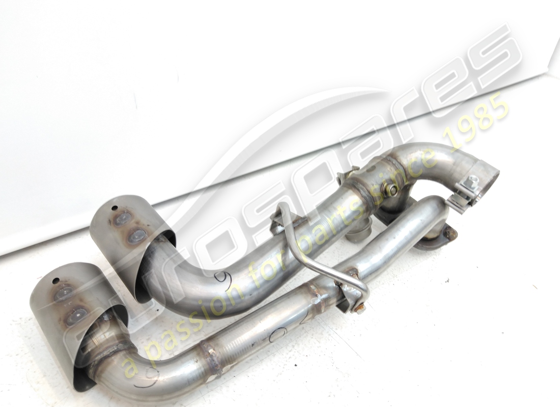 NEW FERRARI LH TAIL PIPE. PART NUMBER 216041 (5) new ferrari lh tail pipe. part number 216041 (5)