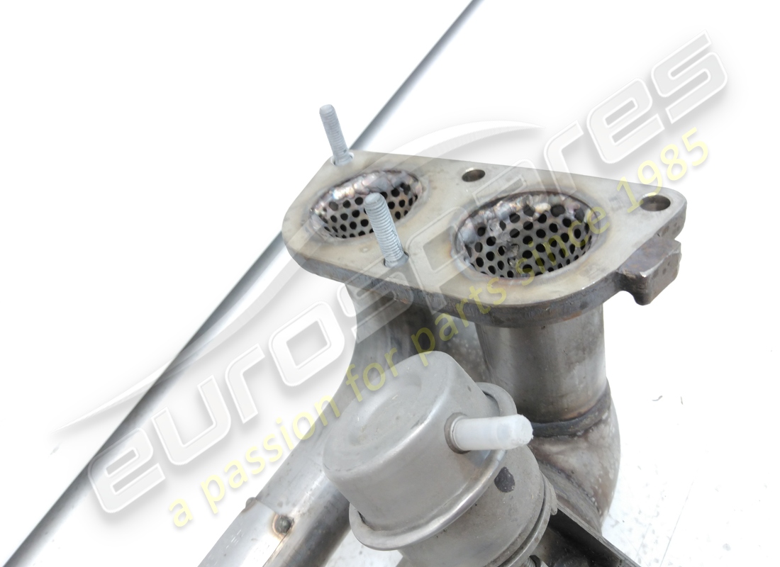 NEW FERRARI LH TAIL PIPE. PART NUMBER 216041 (2) new ferrari lh tail pipe. part number 216041 (2)