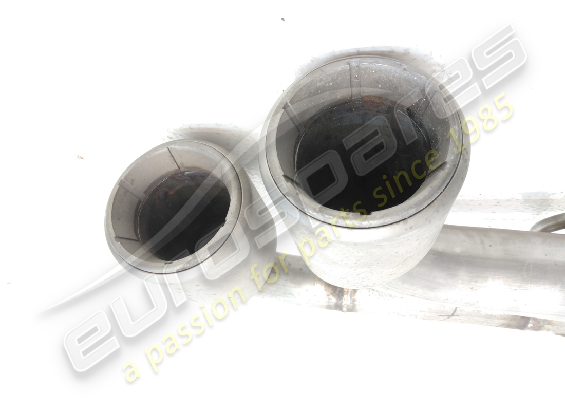 NEW FERRARI RH TAIL PIPE. PART NUMBER 216040 (2) new ferrari rh tail pipe. part number 216040 (2)