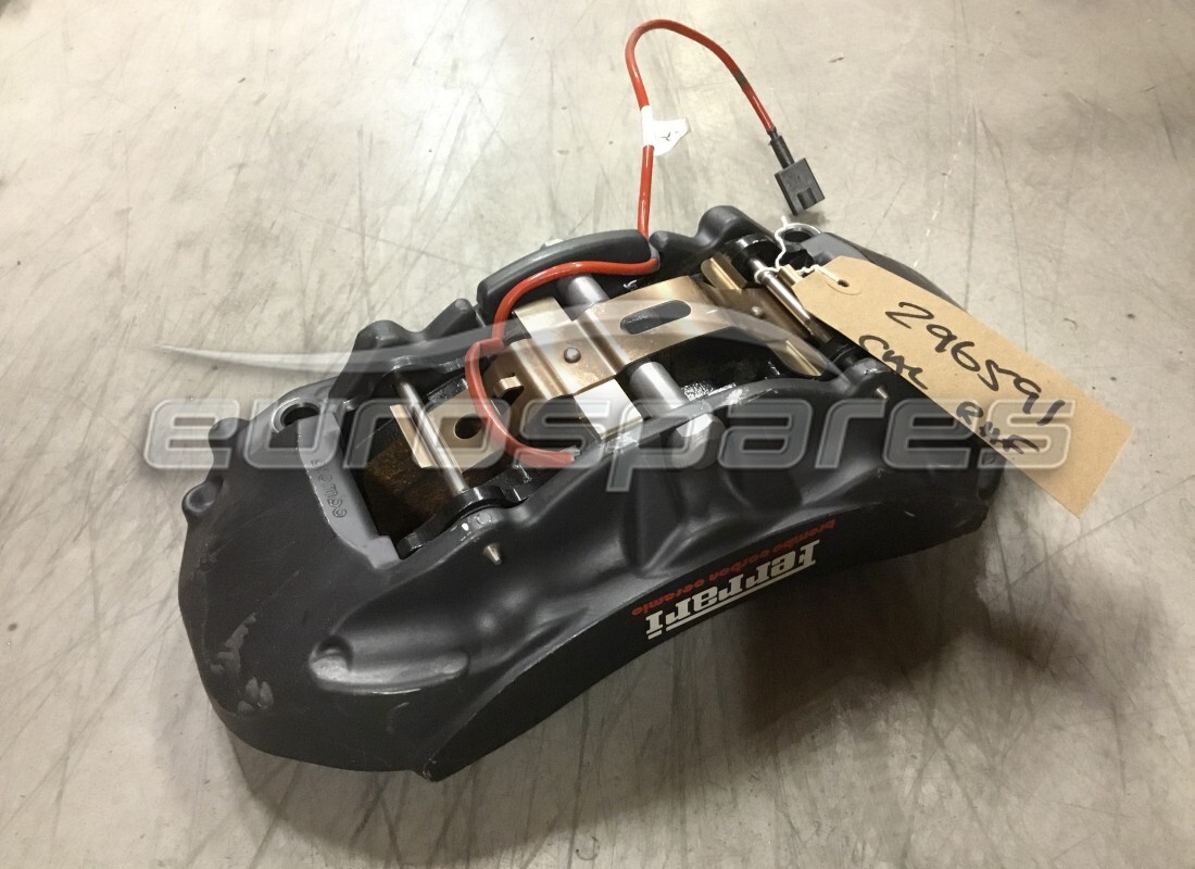 new ferrari rh front caliper complete. part number 296591 (1)