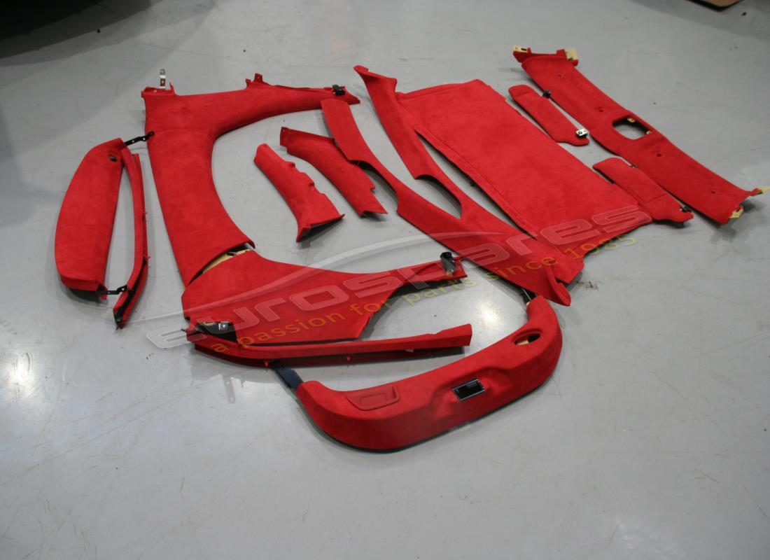 USED FERRARI INTERIOR TRIM KIT IN RED. PART NUMBER 855035000 (1) used ferrari interior trim kit in red. part number 855035000 (1)