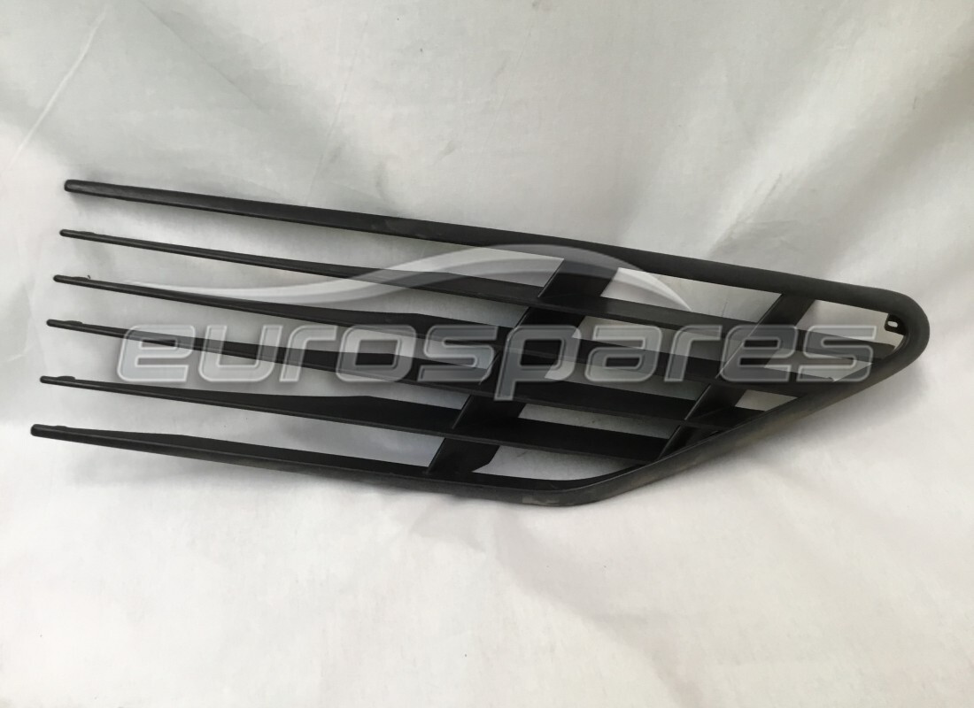 NEW FERRARI LH SIDE INTAKE GRILLE (PLASTIC). PART NUMBER 60671300 (1) new ferrari lh side intake grille (plastic). part number 60671300 (1)