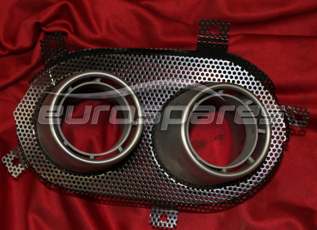 NEW FERRARI LH TAILPIPE GRILLE. PART NUMBER 86090300 (1) new ferrari lh tailpipe grille. part number 86090300 (1)