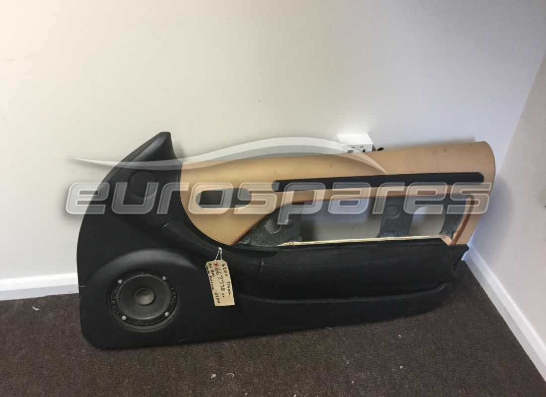 used maserati complete rh door panel upholstered. part number 667738.. (1)