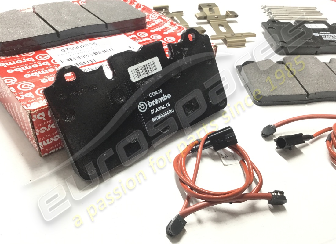 NEW FERRARI KIT OF FRONT PADS. PART NUMBER 70002035 (2) new ferrari kit of front pads. part number 70002035 (2)