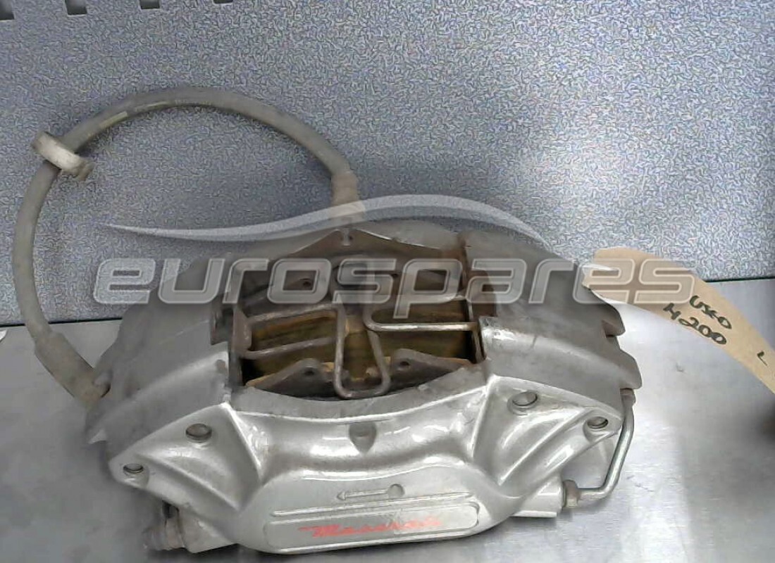 used maserati lh rear caliper -optional-. part number 206224 (1)