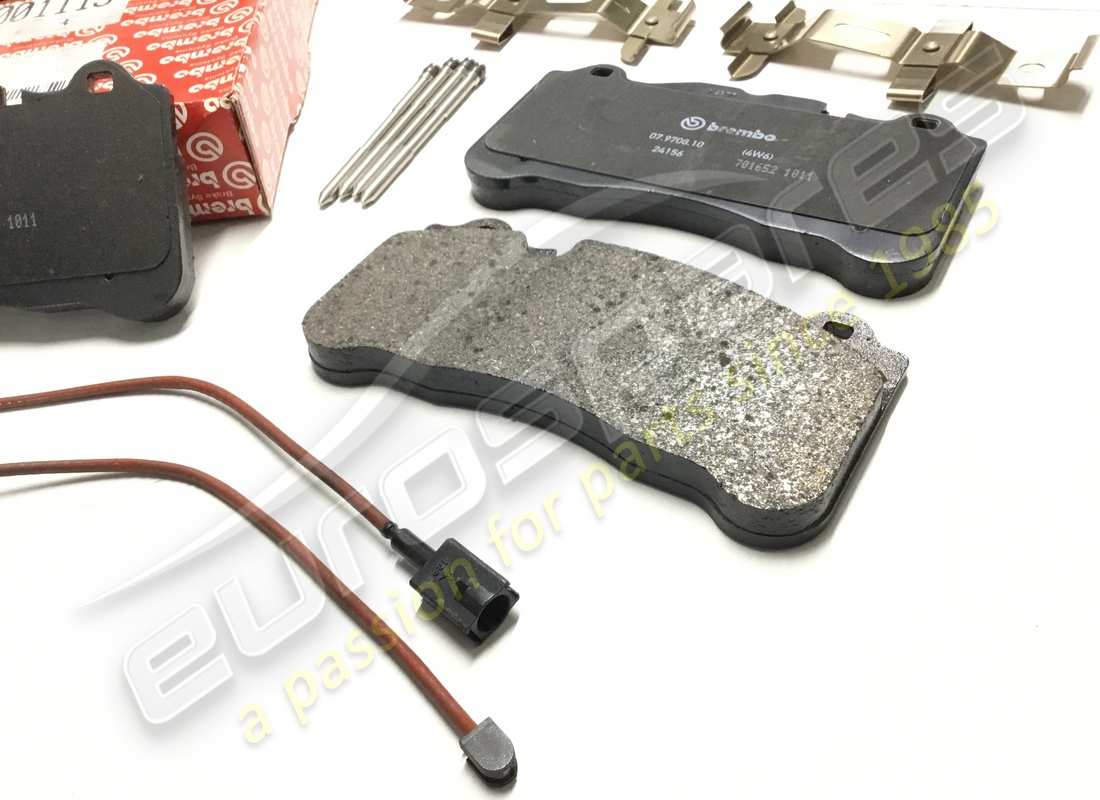 NEW FERRARI CARBON CERAMIC FRONT BRAKE PADS KIT. PART NUMBER 70001119 (3) new ferrari carbon ceramic front brake pads kit. part number 70001119 (3)