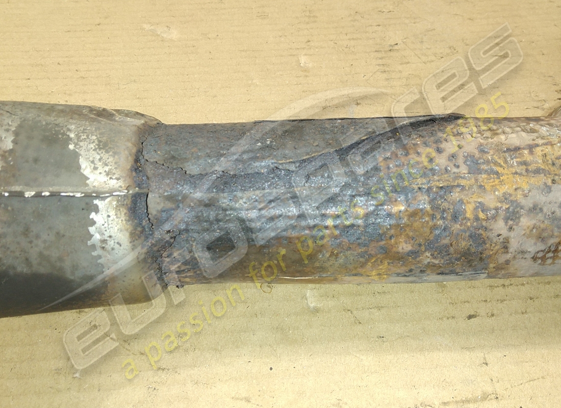 DAMAGED FERRARI RH REAR EXHAUST EXTENSION. PART NUMBER 169296 (2) damaged ferrari rh rear exhaust extension. part number 169296 (2)