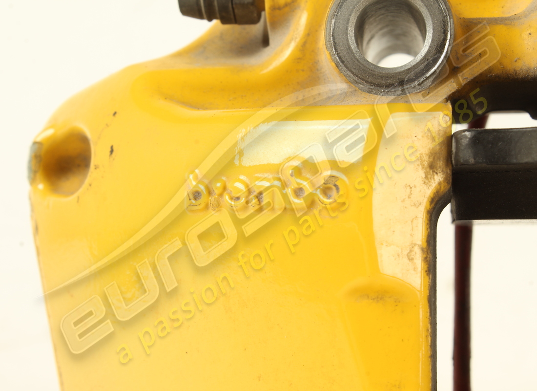 USED FERRARI FRONT LH CALIPER WITH PADS -. PART NUMBER 267314 (3) used ferrari front lh caliper with pads -. part number 267314 (3)