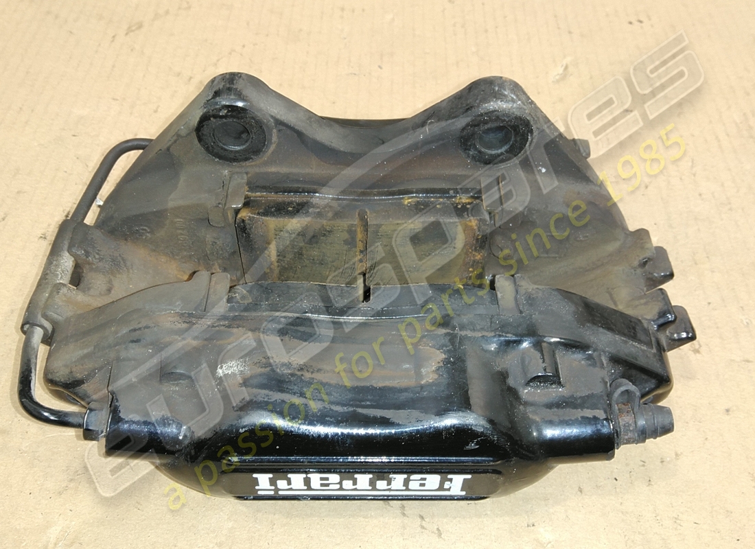 USED FERRARI LH REAR BRAKE CALIPER. PART NUMBER 178907 (3) used ferrari lh rear brake caliper. part number 178907 (3)