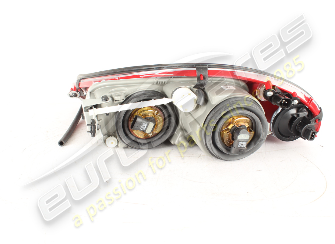 NEW FERRARI RH FRONT HEADLAMP ROSSO CORSA RED (RHD - NON XENON). PART NUMBER 72001369 (3) new ferrari rh front headlamp rosso corsa red (rhd - non xenon). part number 72001369 (3)