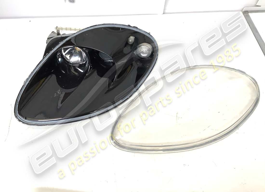 USED FERRARI LH HEADLIGHT ''BLACK''. PART NUMBER 72001471 (3) used ferrari lh headlight ''black''. part number 72001471 (3)