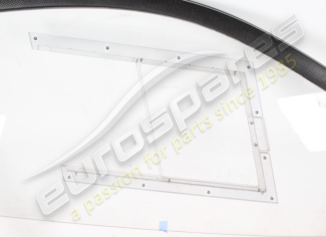 USED FERRARI RH WINDOW FRAME WITH LEXAN WINDOW PANEL. PART NUMBER 89218100 (2) used ferrari rh window frame with lexan window panel. part number 89218100 (2)