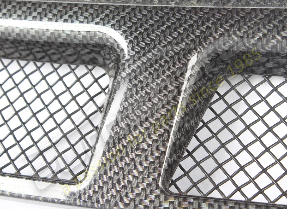 USED FERRARI LH GRILL -GREY-. PART NUMBER 68075100 (2) used ferrari lh grill -grey-. part number 68075100 (2)