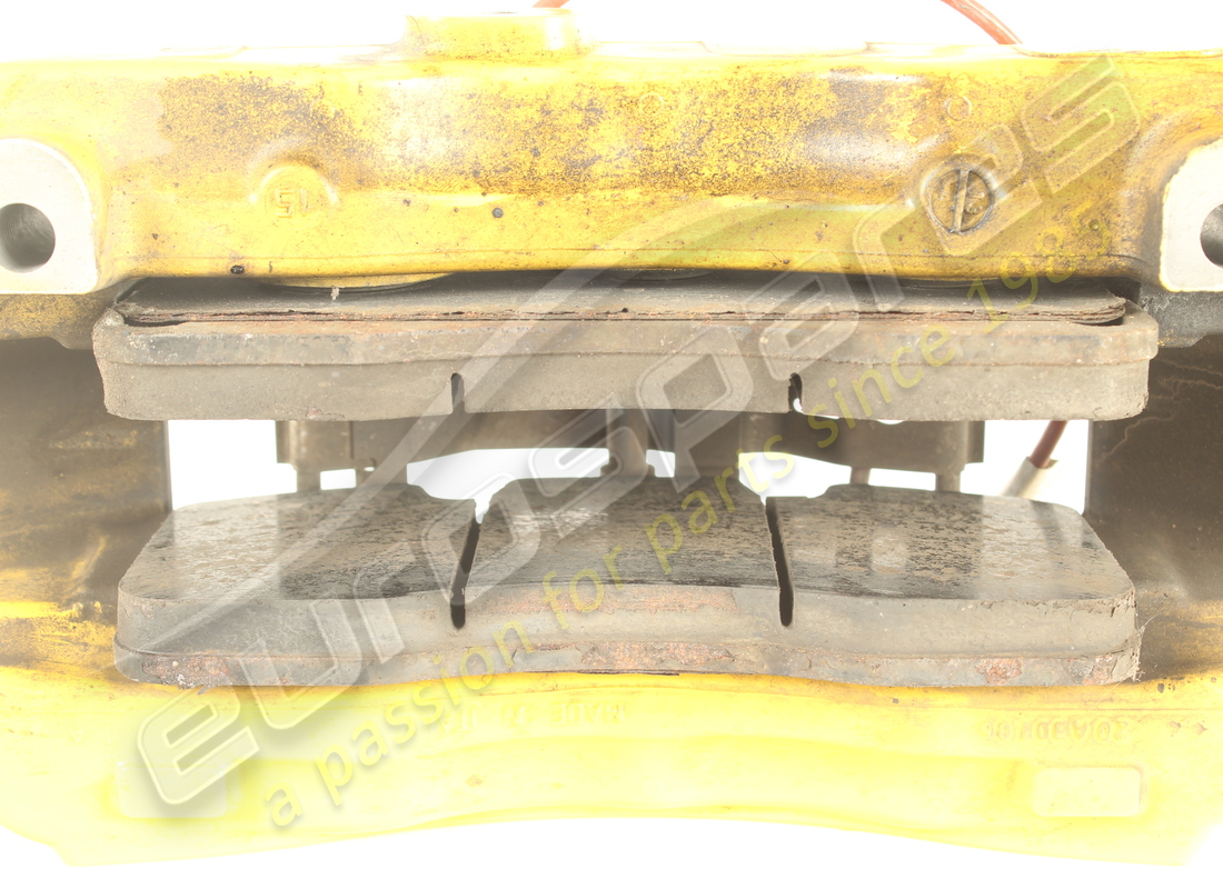 USED FERRARI FRONT RH CALIPER WITH PADS. PART NUMBER 297309 (4) used ferrari front rh caliper with pads. part number 297309 (4)