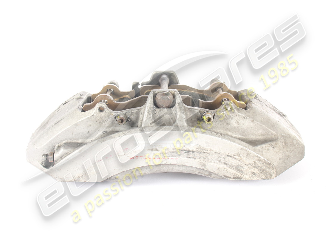 USED FERRARI FRONT LH CALIPER WITH PADS. PART NUMBER 267003 (2) used ferrari front lh caliper with pads. part number 267003 (2)