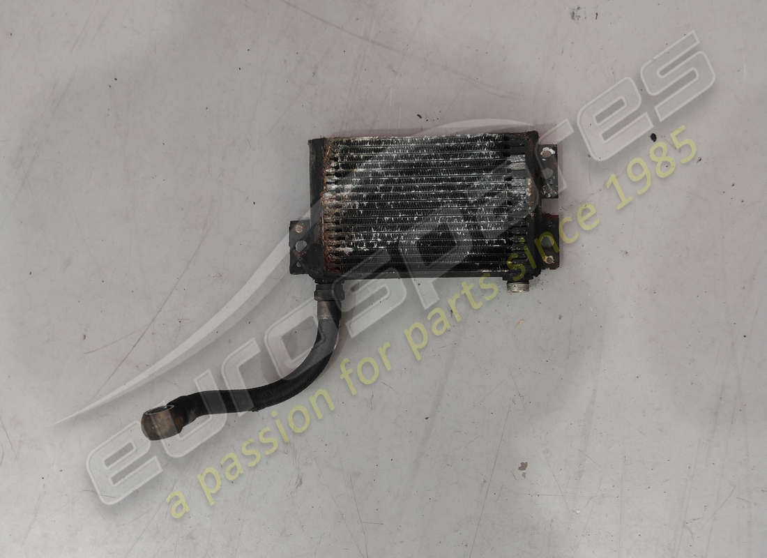USED EUROSPARES OIL COOLER WITH BOTTOM PIPE. PART NUMBER EAP1384378 (1) used eurospares oil cooler with bottom pipe. part number eap1384378 (1)