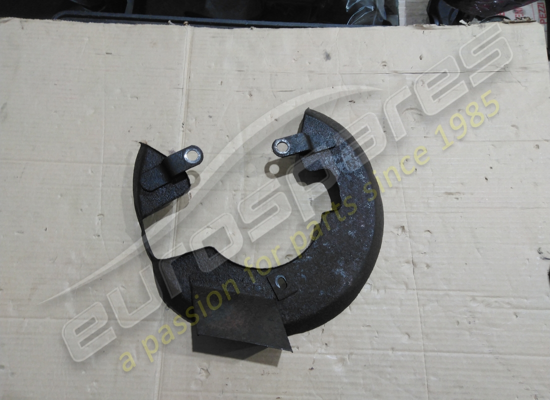 USED Ferrari LH BRAKE DISC SHIELD . PART NUMBER 104597 (1)