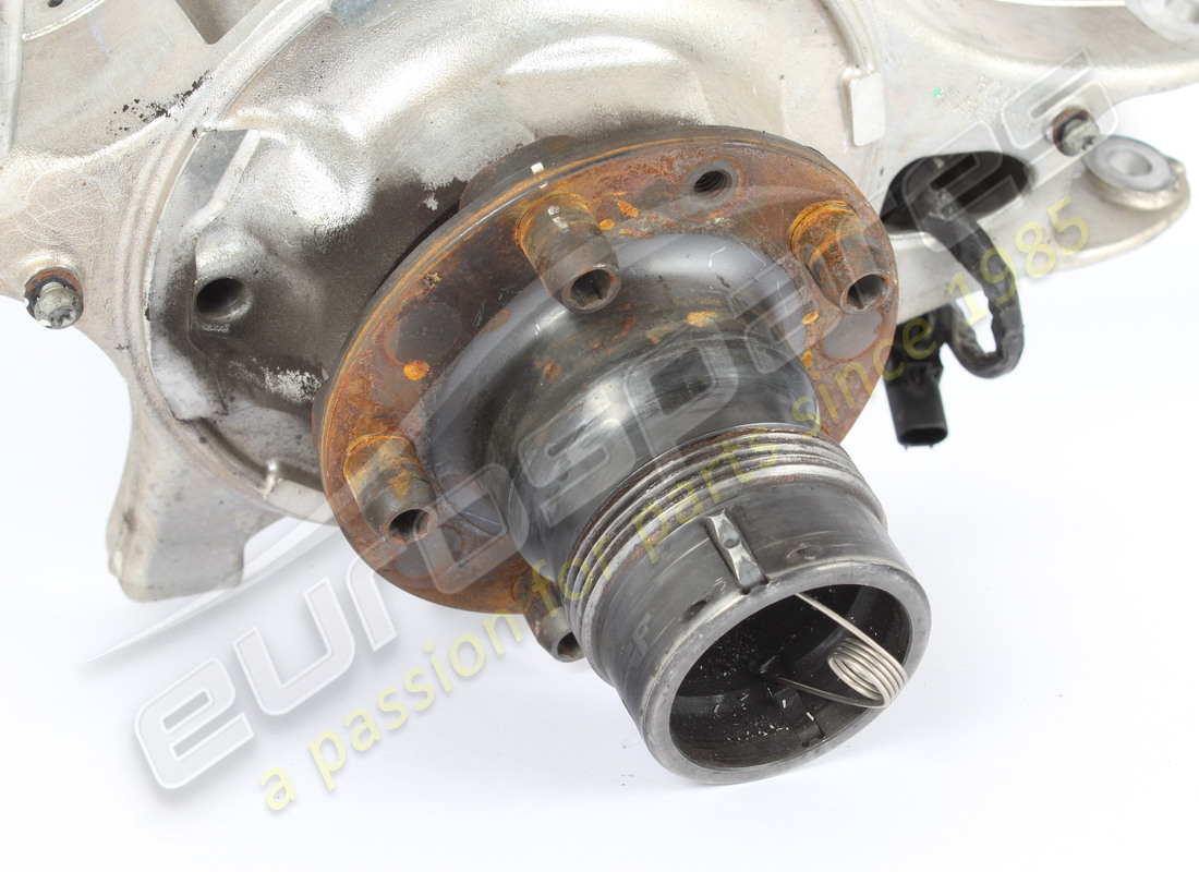 USED FERRARI COMPLETE RH REAR HUB CARRIER. PART NUMBER 335320 (2) used ferrari complete rh rear hub carrier. part number 335320 (2)