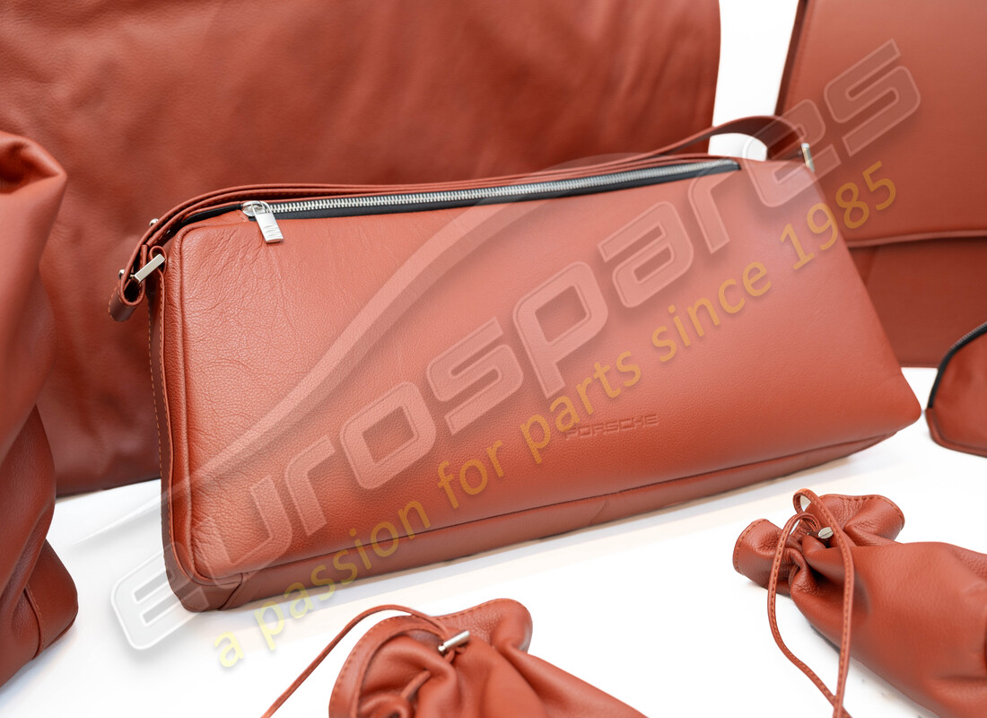 NEW PORSCHE TRAVEL BAGS SET - TERRACOTTA. PART NUMBER 98080230101 (2) new porsche travel bags set - terracotta. part number 98080230101 (2)