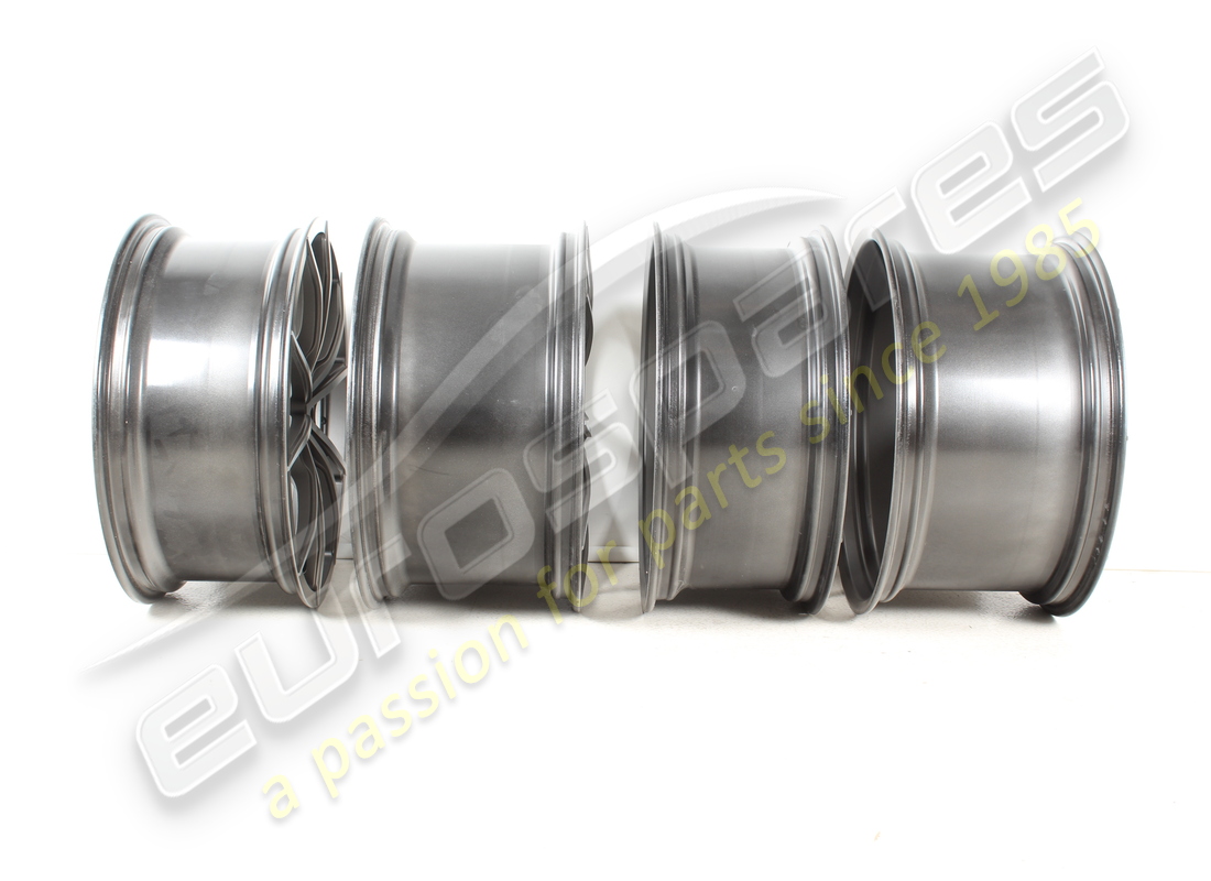 NEW FERRARI WHEEL SET (FORGED GRIGIO CORSA DIAMOND POLISHED) 20 INCH WITH STUDS. PART NUMBER 70002004 (3) new ferrari wheel set (forged grigio corsa diamond polished) 20 inch with studs. part number 70002004 (3)