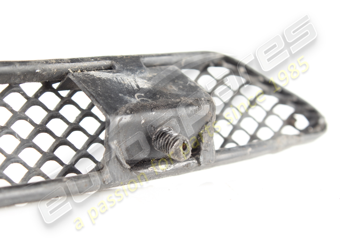 USED FERRARI COMPLETE LH FRONT FENDER GRILL. PART NUMBER 64656900 (3) used ferrari complete lh front fender grill. part number 64656900 (3)