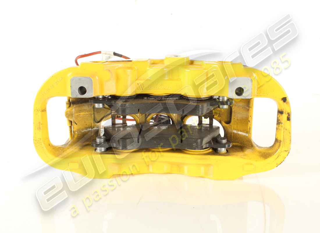 USED FERRARI FRONT LH CALIPER WITH PADS. PART NUMBER 322140 (3) used ferrari front lh caliper with pads. part number 322140 (3)