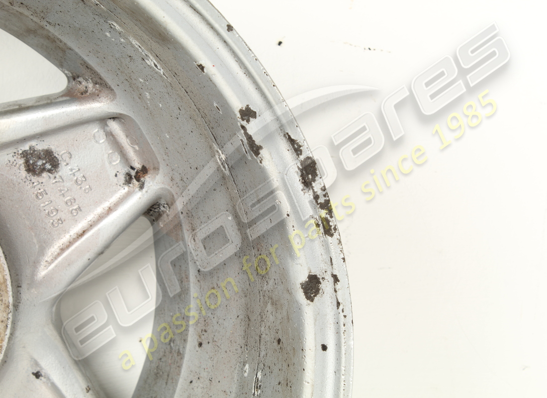 USED FERRARI ROAD WHEEL FRONT 3.2 MQV. PART NUMBER 127465 (5) used ferrari road wheel front 3.2 mqv. part number 127465 (5)