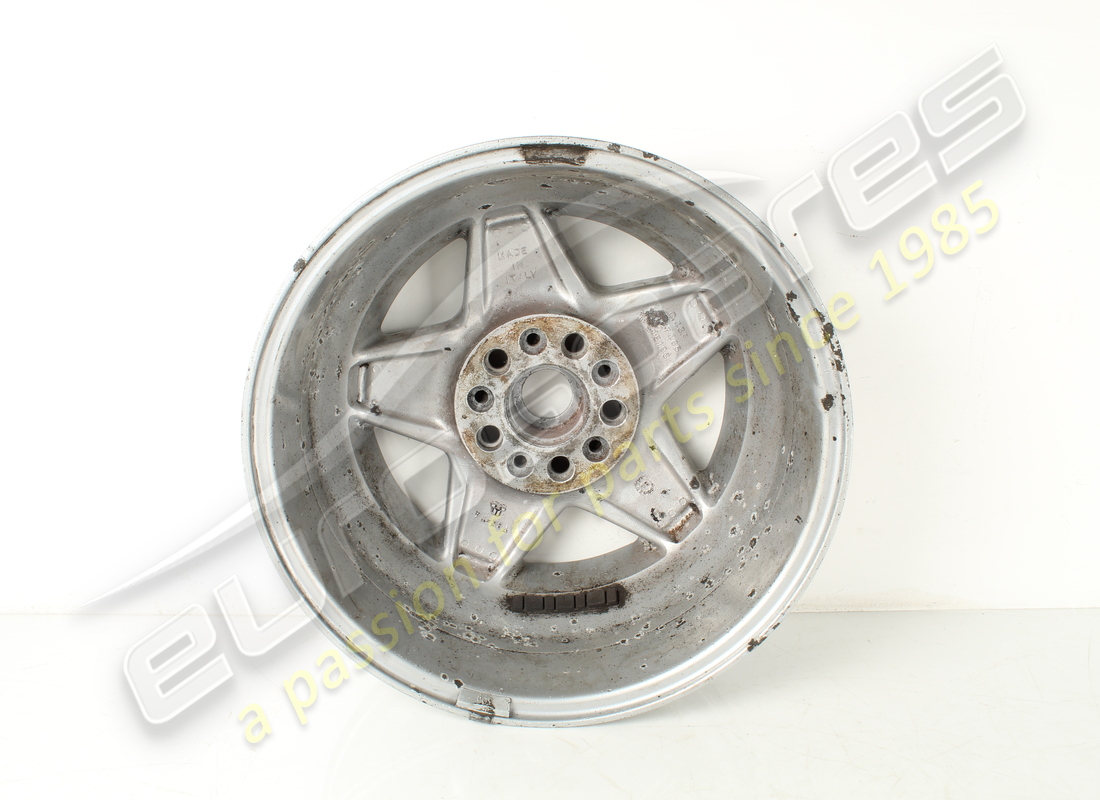 USED FERRARI ROAD WHEEL FRONT 3.2 MQV. PART NUMBER 127465 (6) used ferrari road wheel front 3.2 mqv. part number 127465 (6)
