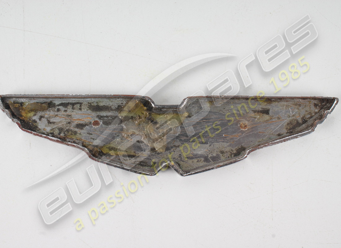 USED ASTON MARTIN BADGE ASSEMBLY - AML. PART NUMBER 4G43407A74BB (3) used aston martin badge assembly - aml. part number 4g43407a74bb (3)
